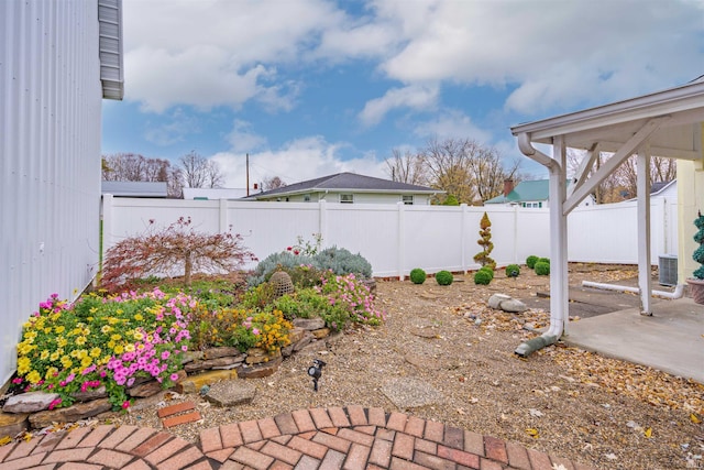 view of yard featuring central AC