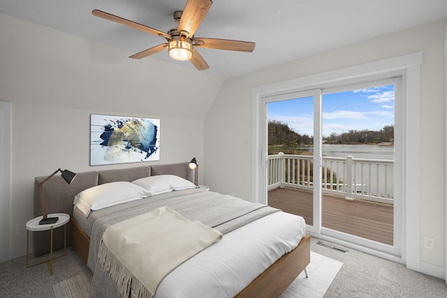 bedroom with ceiling fan, carpet floors, access to outside, and vaulted ceiling