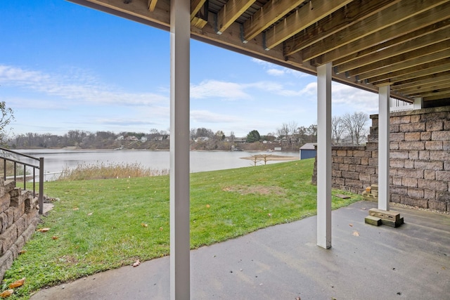 view of patio / terrace featuring a water view