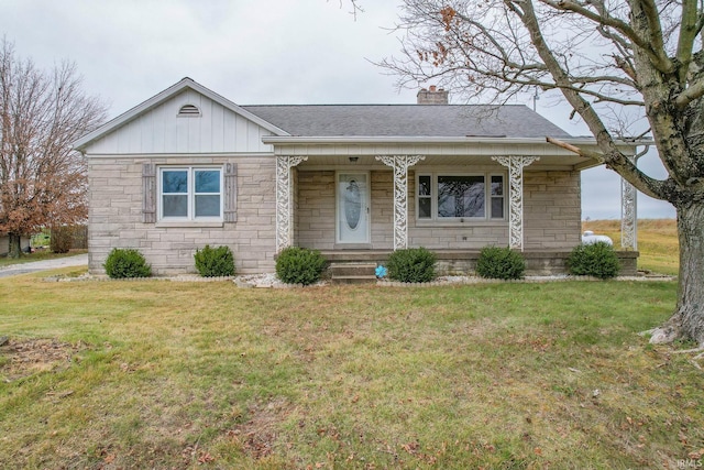 ranch-style house with a front lawn