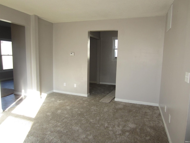 empty room featuring carpet