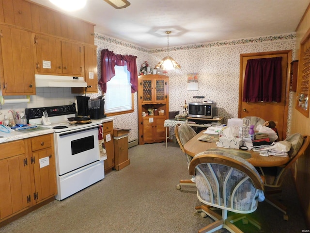 kitchen featuring under cabinet range hood, light countertops, stainless steel microwave, white electric range oven, and wallpapered walls