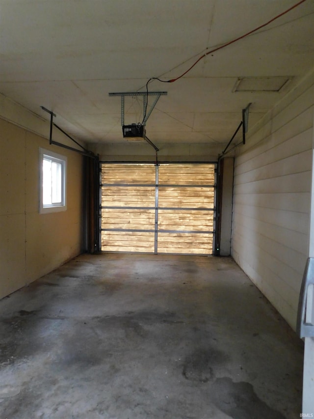 garage featuring a garage door opener