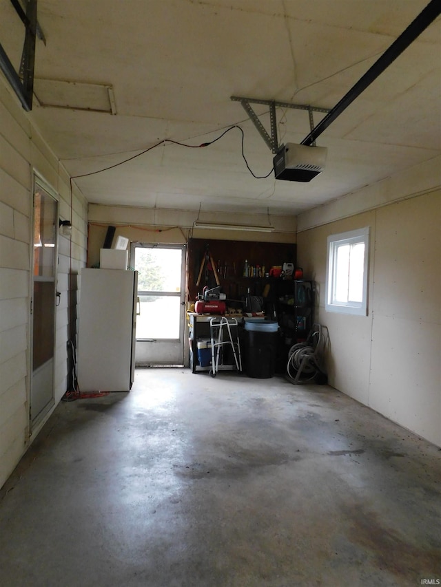 garage featuring a garage door opener