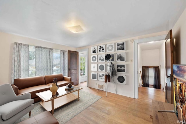 living room featuring light wood-type flooring