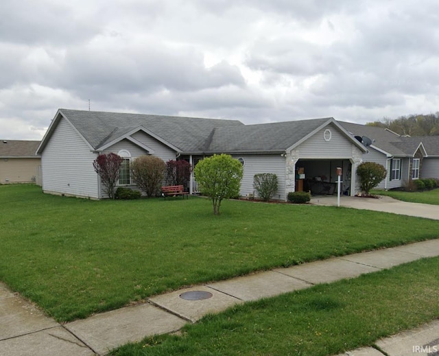 ranch-style home with a garage and a front lawn