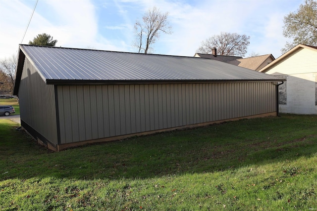 view of property exterior featuring a lawn