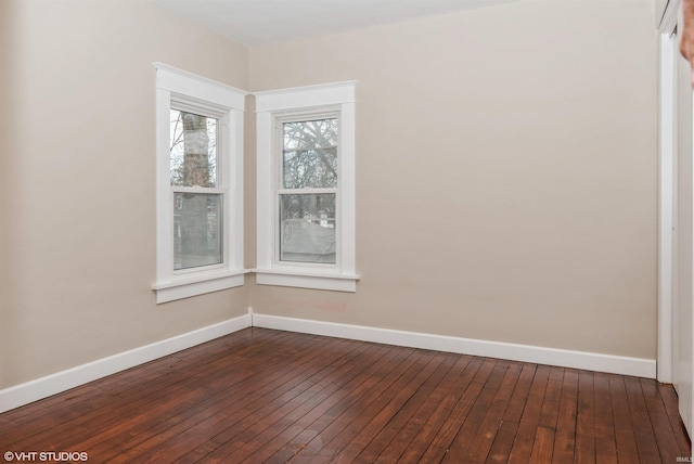 empty room with wood-type flooring