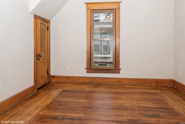 spare room featuring hardwood / wood-style floors