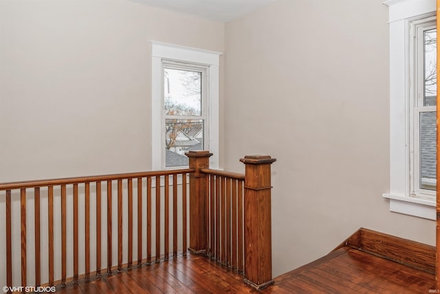 stairway with wood-type flooring