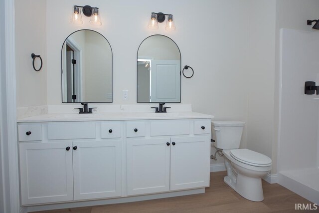 1609 Theo Dr Unit 2, Evansville, IN 47711 - bathroom with hardwood / wood-style floors, vanity, and toilet