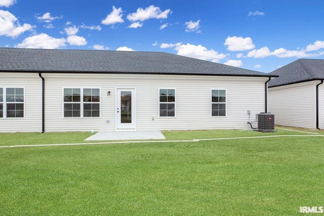 1609 Theo Dr Unit 2, Evansville, IN 47711 - rear view of house featuring a yard and cooling unit