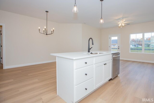 1609 Theo Dr Unit 2, Evansville, IN 47711 - kitchen with sink, stainless steel dishwasher, an island with sink, decorative light fixtures, and light hardwood / wood-style floors