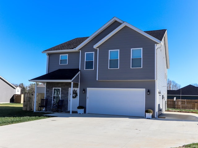 front of property featuring a garage