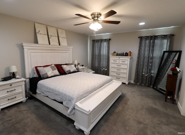 carpeted bedroom featuring ceiling fan