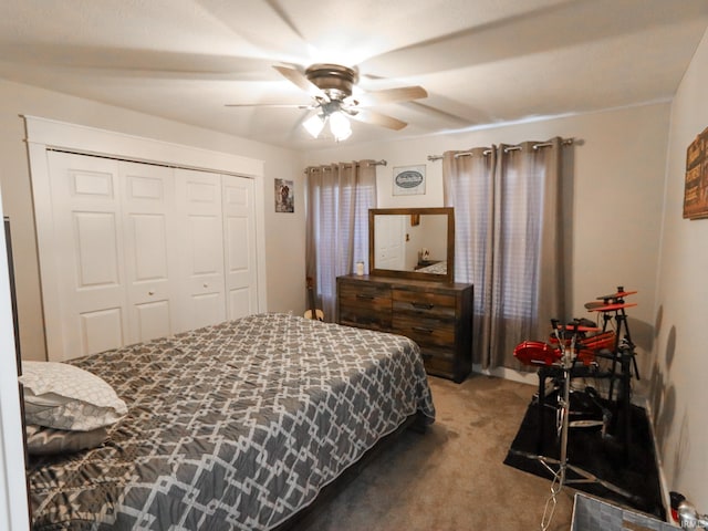 carpeted bedroom featuring ceiling fan and a closet