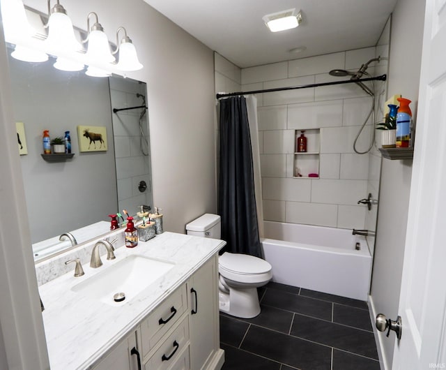 full bathroom featuring tile patterned flooring, vanity, toilet, and shower / tub combo with curtain