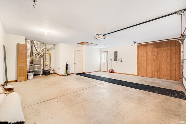 garage featuring electric panel, a garage door opener, heating unit, and water heater