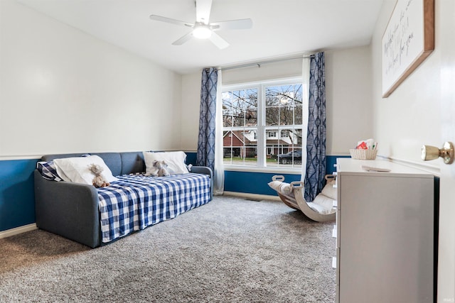 living room with carpet flooring and ceiling fan