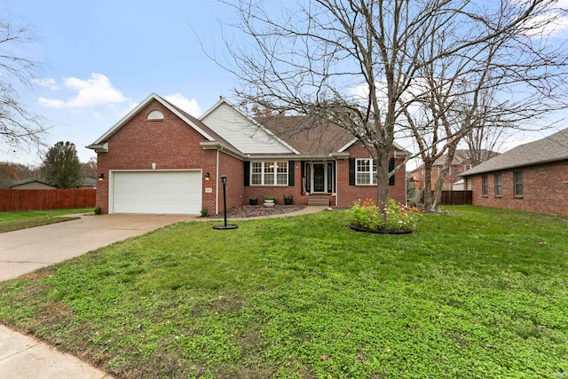 view of front of home with a garage and a front yard