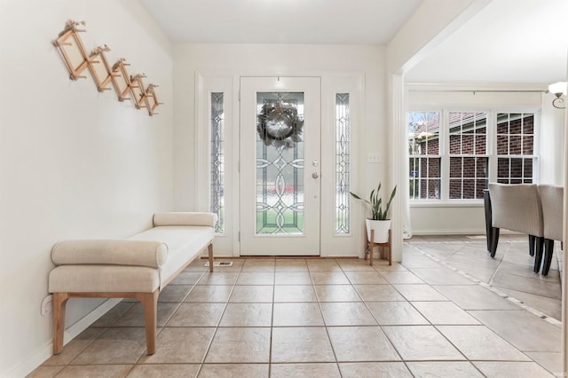 foyer with light tile patterned flooring