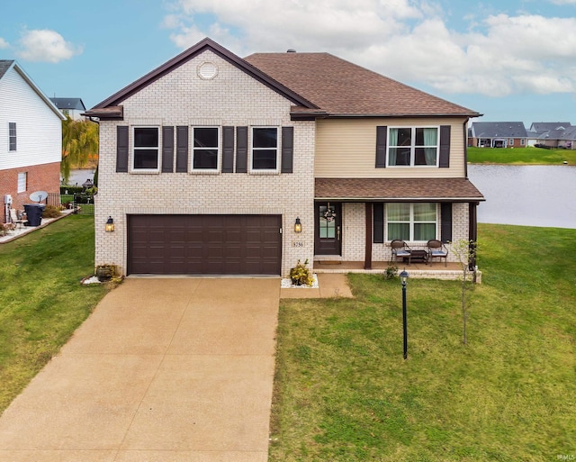 view of front of home featuring a porch, a garage, and a front lawn