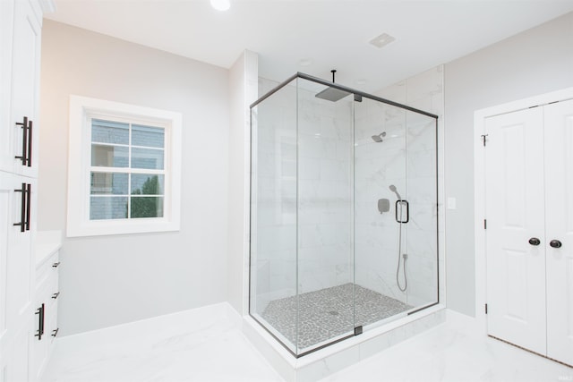 bathroom featuring vanity and walk in shower