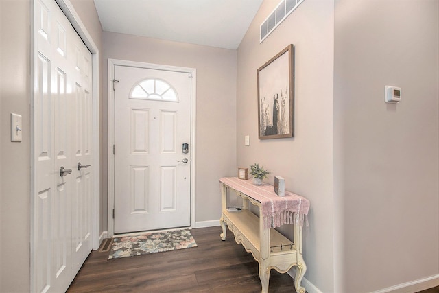 entrance foyer featuring dark hardwood / wood-style flooring