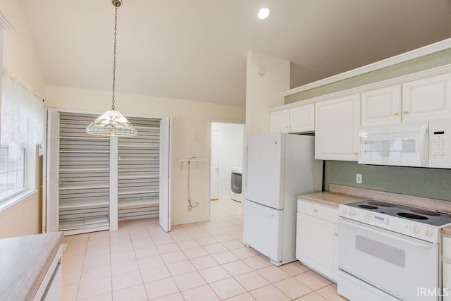 kitchen featuring white appliances, light tile patterned floors, washer / clothes dryer, white cabinetry, and hanging light fixtures