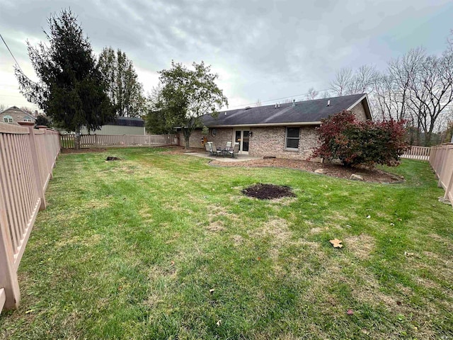 view of yard with a patio area