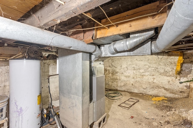 utility room featuring gas water heater and heating unit