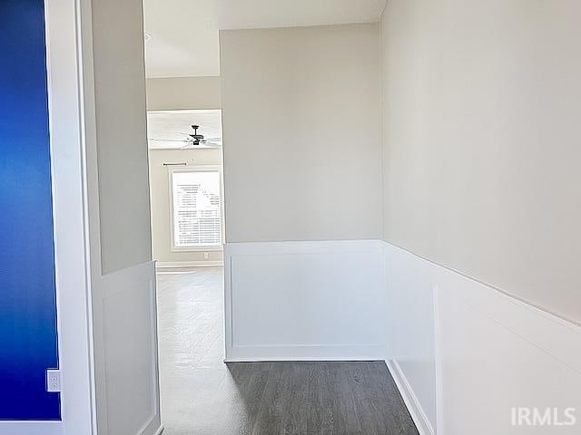 hallway with dark wood-type flooring