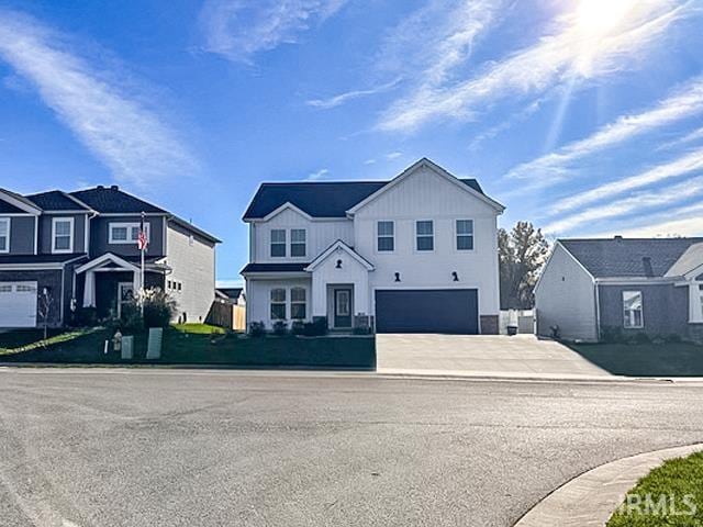 front facade with a garage