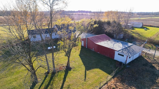 birds eye view of property with a rural view