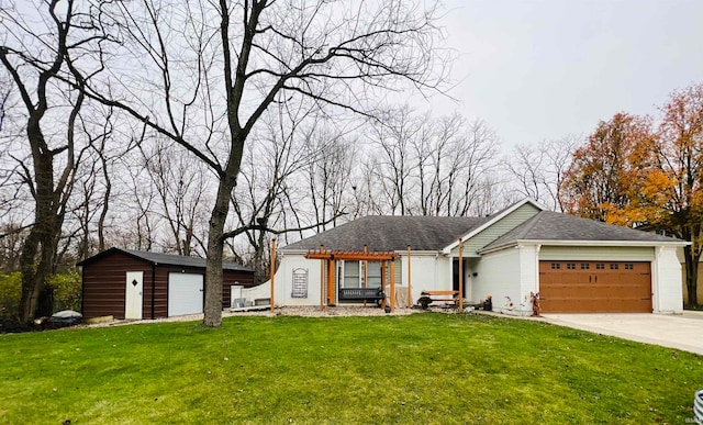 ranch-style house with a storage unit and a front lawn