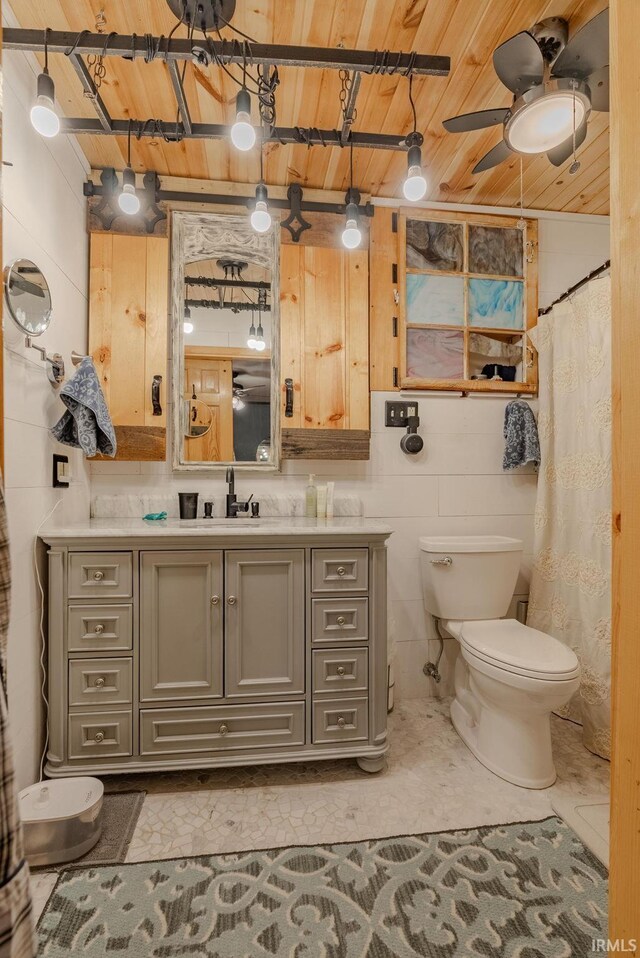 bathroom with wood ceiling, vanity, ceiling fan, concrete floors, and toilet