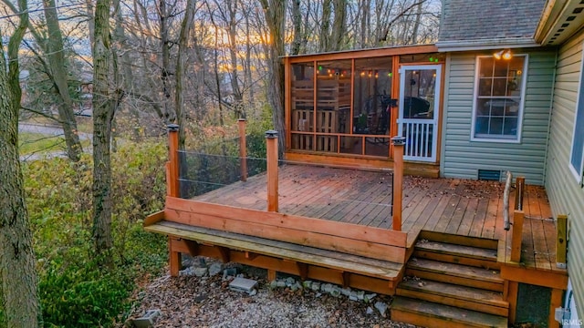 wooden terrace with a sunroom