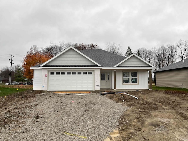 single story home featuring a garage