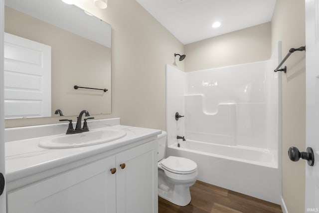 10209 Buckshire Ct, New Haven, IN 46774 - full bath with toilet, wood finished floors, vanity, and bathtub / shower combination
