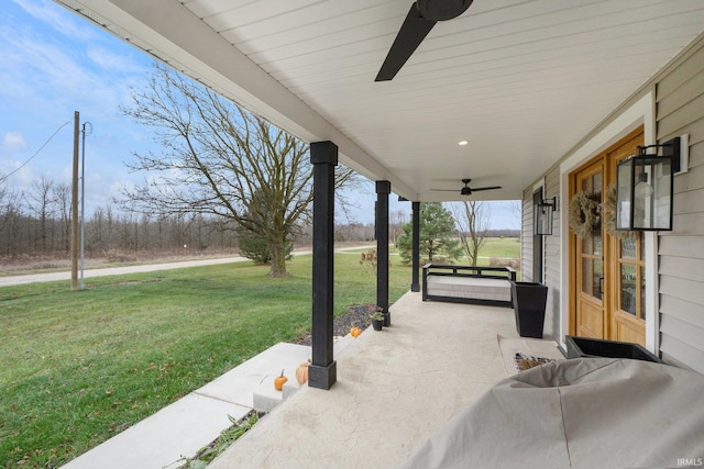 view of patio / terrace featuring ceiling fan and covered porch