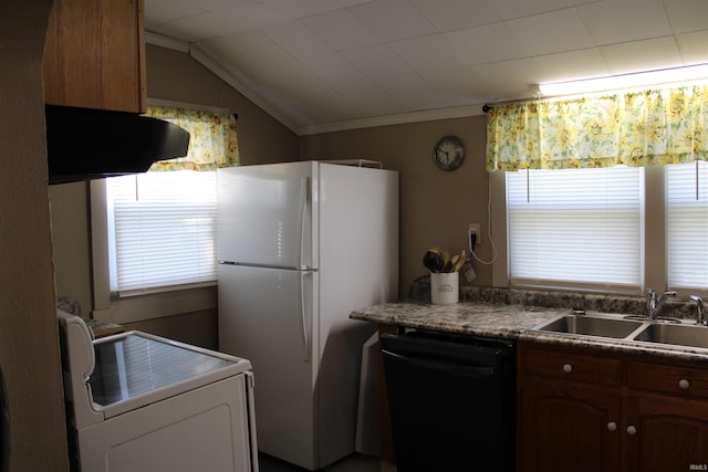 kitchen featuring stove, sink, black dishwasher, white fridge, and lofted ceiling