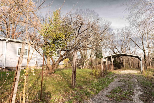 view of yard featuring a carport