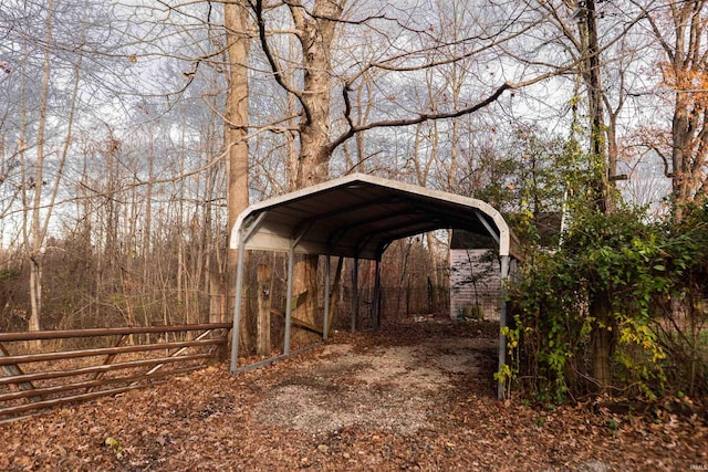 view of outbuilding with a carport