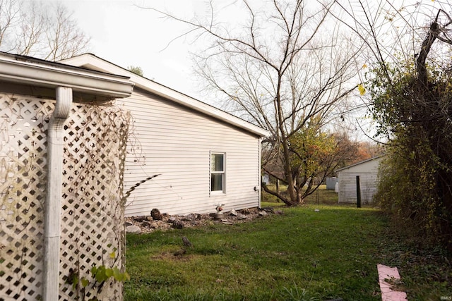 view of property exterior with a lawn