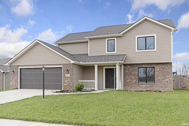 front of property featuring a porch, a garage, and a front lawn