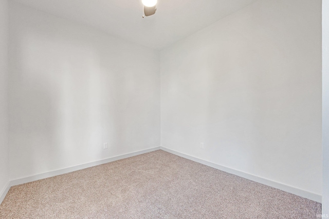 unfurnished room featuring carpet flooring