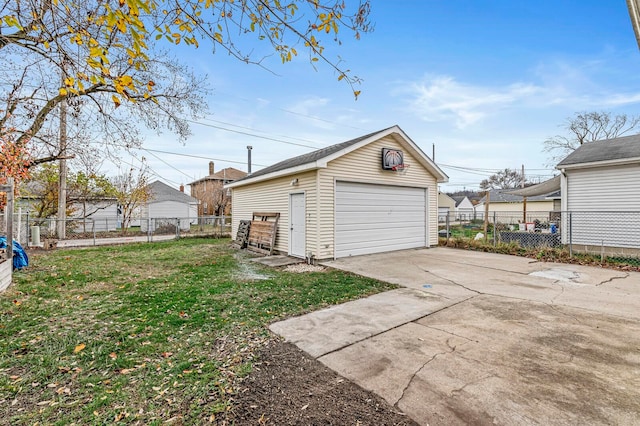 garage with a yard