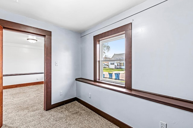 corridor featuring carpet floors