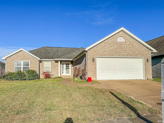 view of front facade featuring a garage and a front lawn