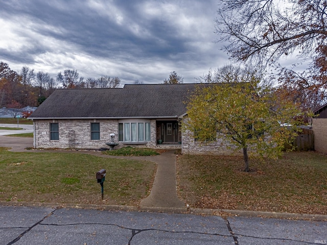 view of front facade with a front lawn